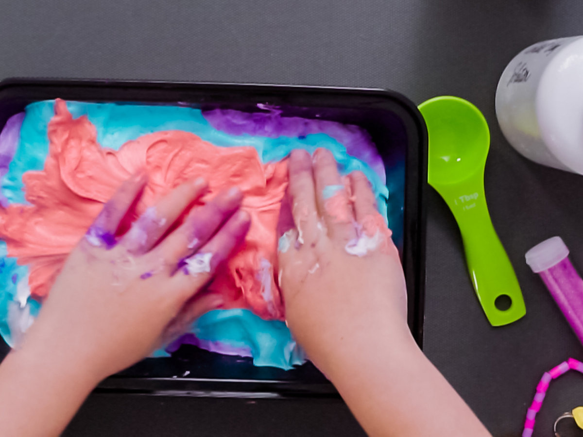 A child enjoying a sensory slime activity